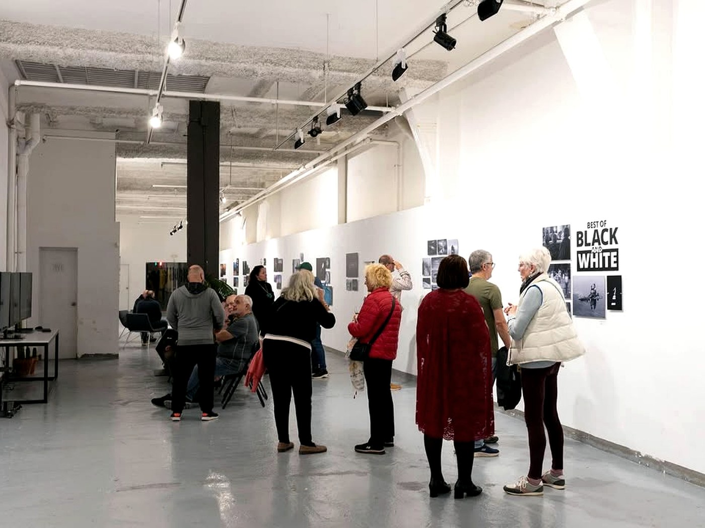 Visitors gathering at a photography exhibition at Valid World Hall