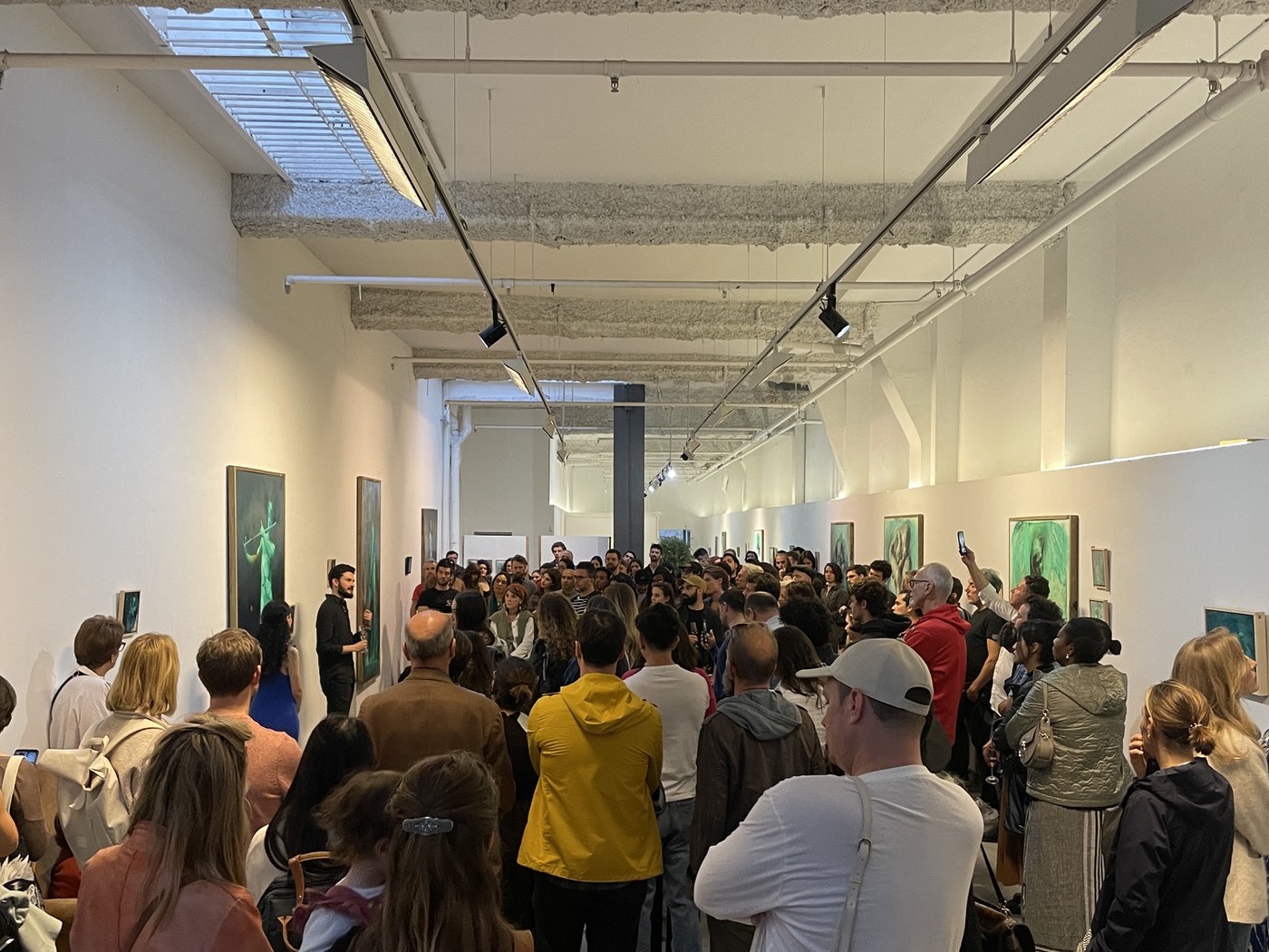 Guests attending an exhibition talk at Valid World Hall